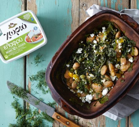 Beans with greens and feta cheese baked in the hull