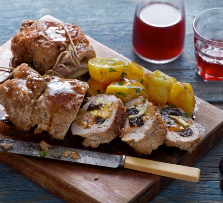 Juicy pork roll with prunes and juniper berries