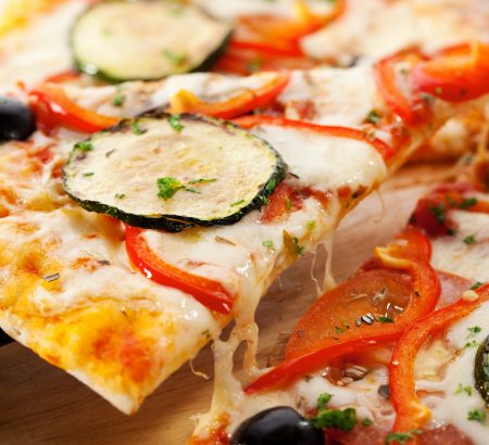 Vegetarian pizza with graviera cheese, aubergine, artichoke and Horio organic Kalamata olives