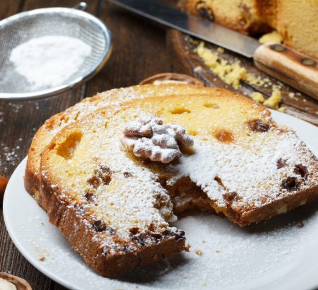 Raisins and walnuts cake with orange glaze