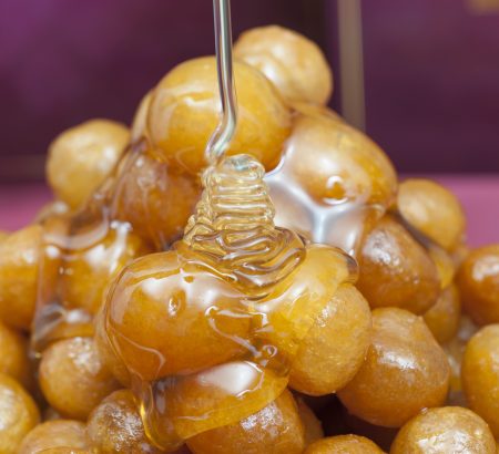 Traditional doughballs with honey and cinnamon