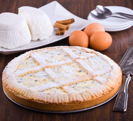 Sweet pie with anthotyro cheese, honey and butter