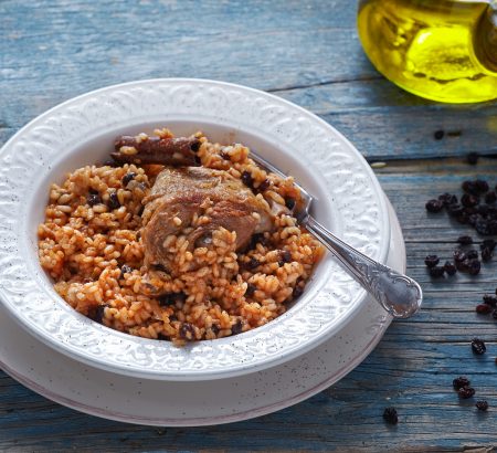 Lamb with pilaf and raisins